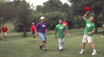 Some guys playing frisbee